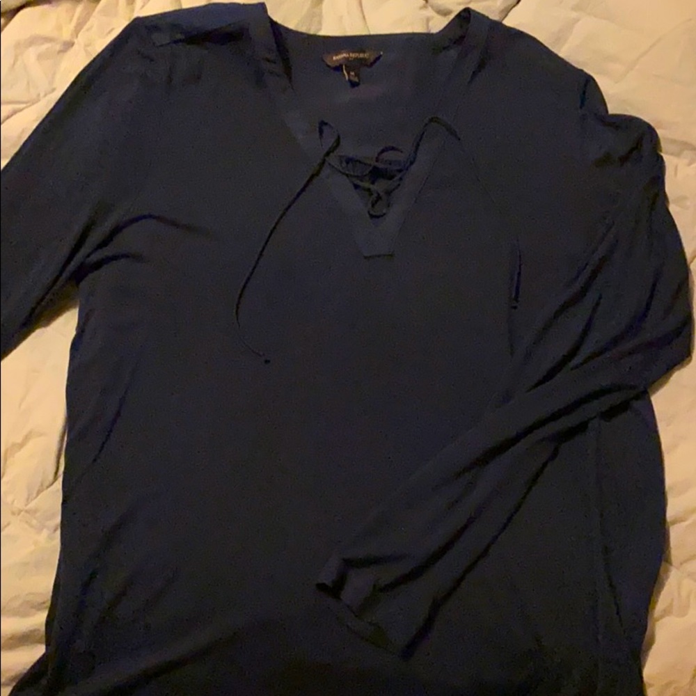 Long sleeve lace up top with silk. Size M